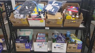 Rolling Rack: Big box store items: Colgate toothpaste, Napkins, Flipz, Hershey Kisses, Plates, Baby