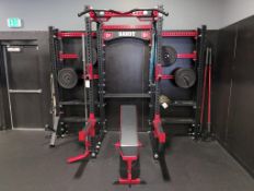 One station Sorinex system with barbells plates. Some straps inclined bench