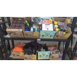 Rolling rack: Big box store items: Lots of M&M's, Windex, All Plates, Hershey Nuggets, Candy packs,