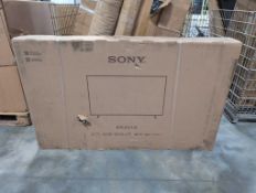 Wire bin- Sony Bravia 65" ( damaged?), alum frame, misc furniture, cushions and more