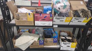 Rolling rack: Big box store items: ring pops, Misc clothing, Glad, Snickers, bedding, dove soap, her