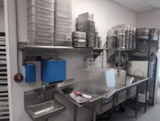 Two stainless shelves and green stainless rack with contents. (Not the dishwashing unit) tongs ladle