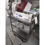 Stainless steel cart on wheels w/ contents