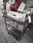 Stainless steel cart on wheels w/ contents