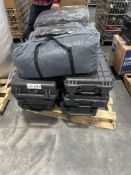 pallet of waterproof cases and what appears to be a tent