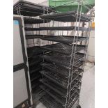 Two rolling bread racks, stainless shelf and rolling cart and other items