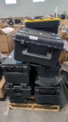 pallet of multiple sizes of waterproof travel cases and storage bins