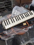 Suzuki m37c melodian approximately 5 with case, water proof cases and more