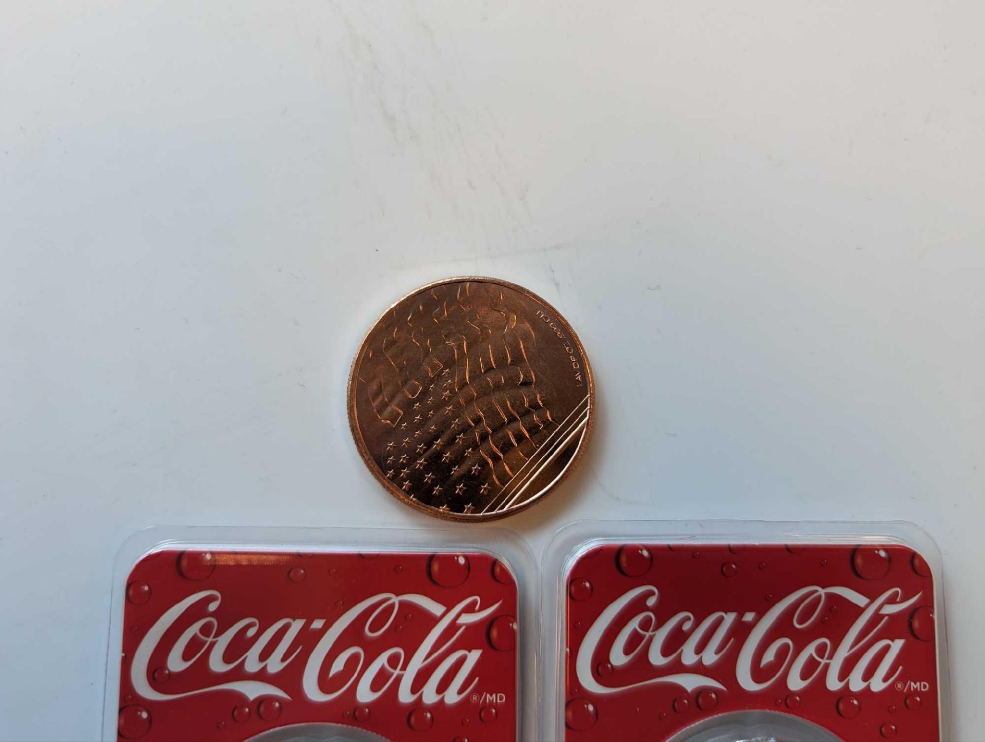 two silver Coca-Cola coins with copper American flag coin - Image 2 of 3