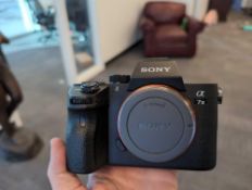 Sony A7 iii mirrorless camera with samyang af 50mm f/1.4 fe lens and Sony optical steady shot lens a