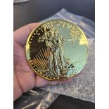 1/2 lb gold-plated 8 oz fine silver coin