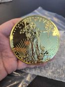 1/2 lb gold-plated 8 oz fine silver coin