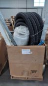 rolled mattress, Post hole shovel, green Dolly, metal item and more