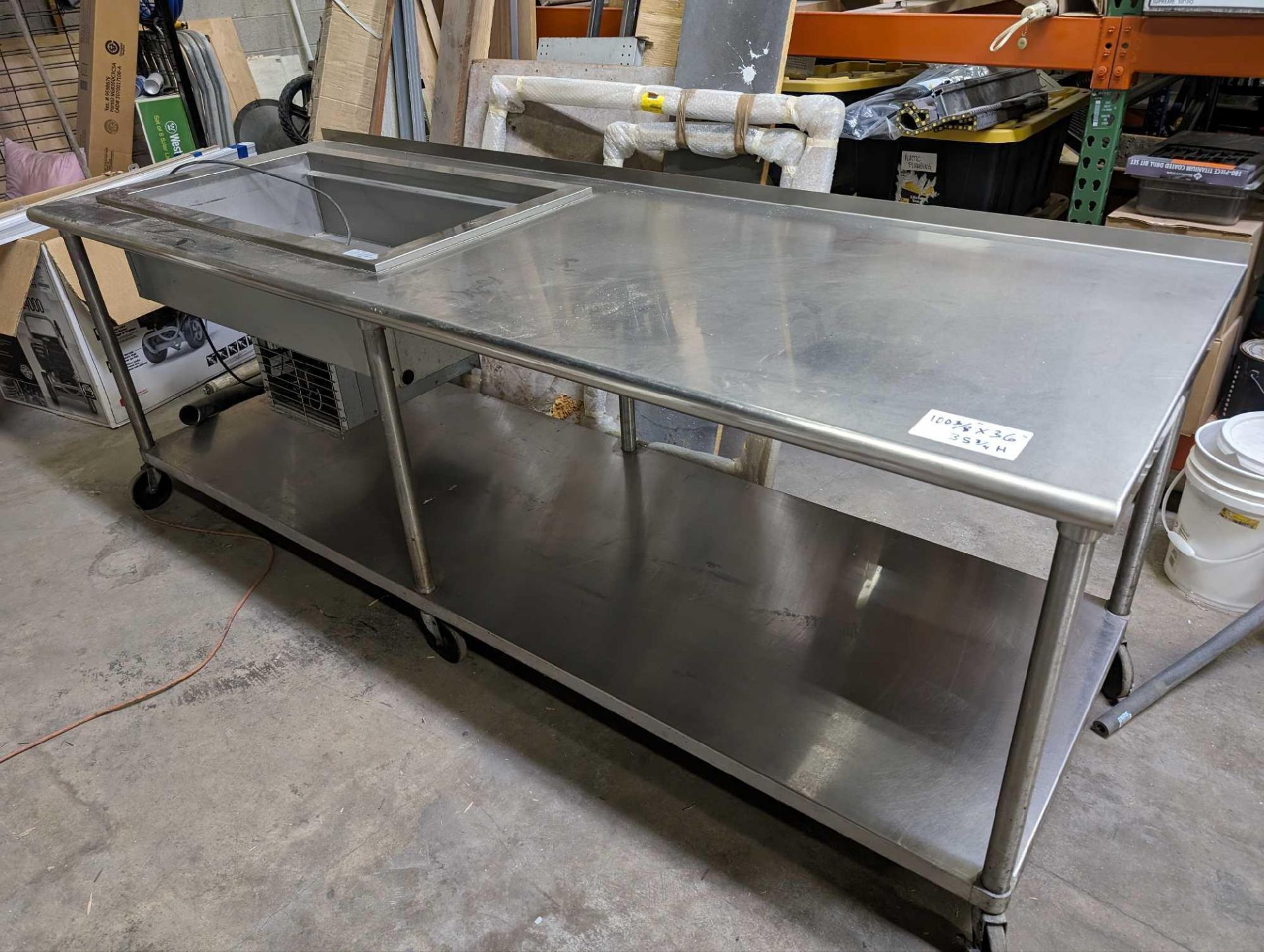 stainless steel table with drop in sync and cooler. 3785 west 1987 South Pickup: Thursday 3-5 & Frid