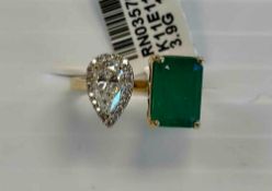 Emerald & Diamond ring 18KT 3.31 cts Emerald 0.69 cts Center Diamond, 0.79 cts Total Diamond