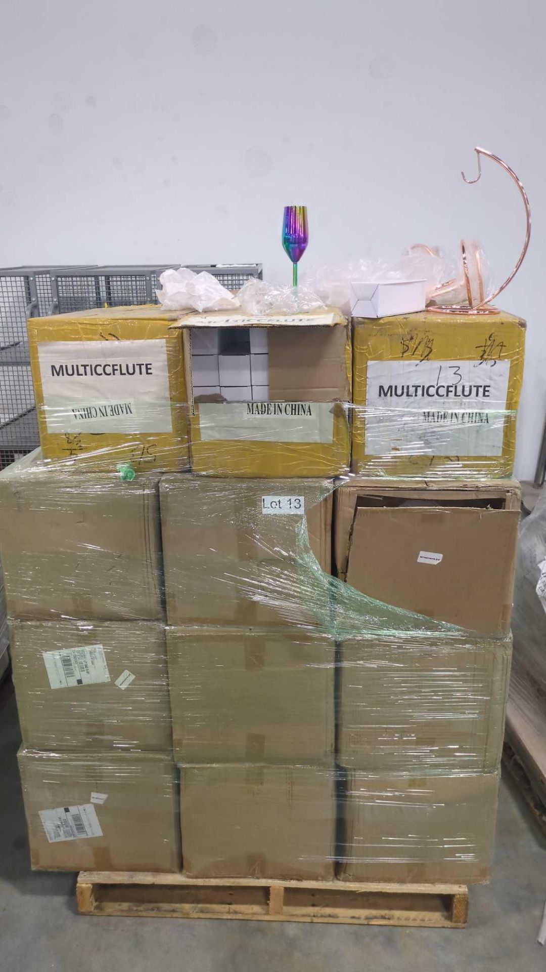 pallet of multiccflutes and metal banana stands