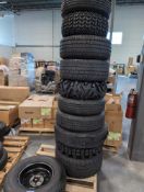 pallet of tires with wheels. multiple sizes and makes