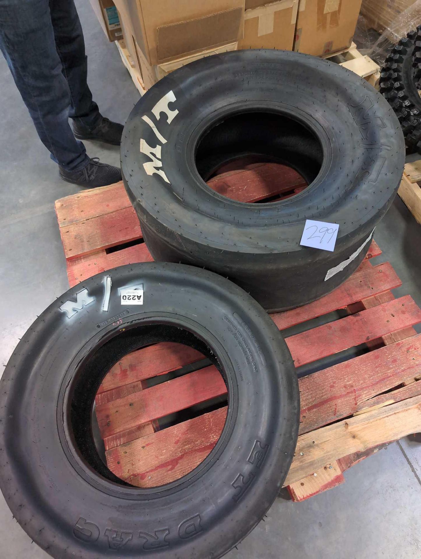 two large m/t drag racing tires