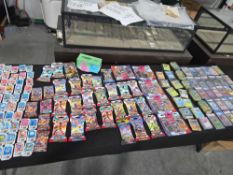 large table lot of pokemon cards new in packs