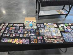 table lot of football cards baseball cards vintage cards vintage books memorabilia and more