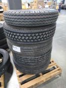 pallet of large tires and semi tires