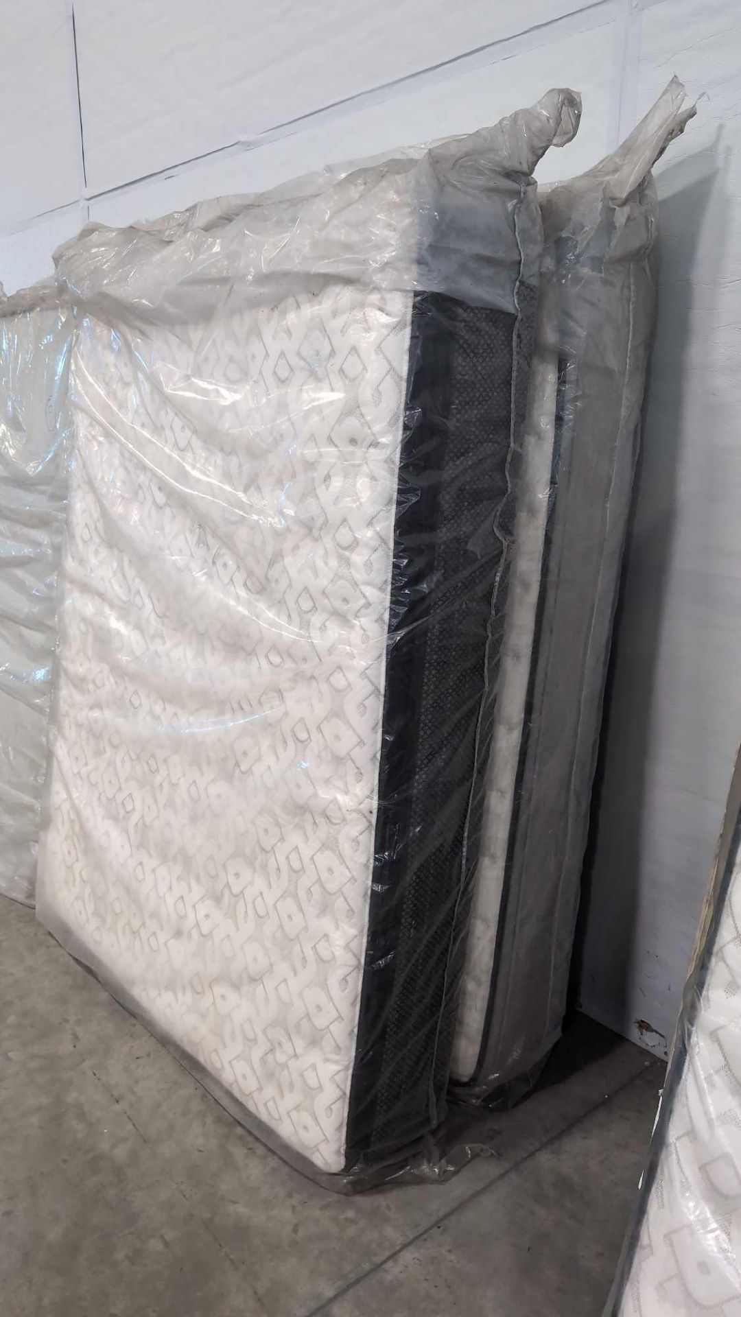 two new queen mattresses