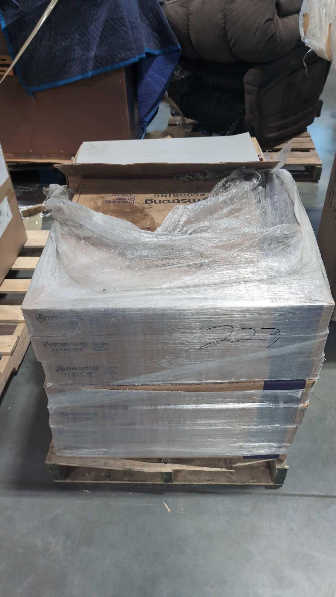 Boxes of Armstrong Commercial Flooring