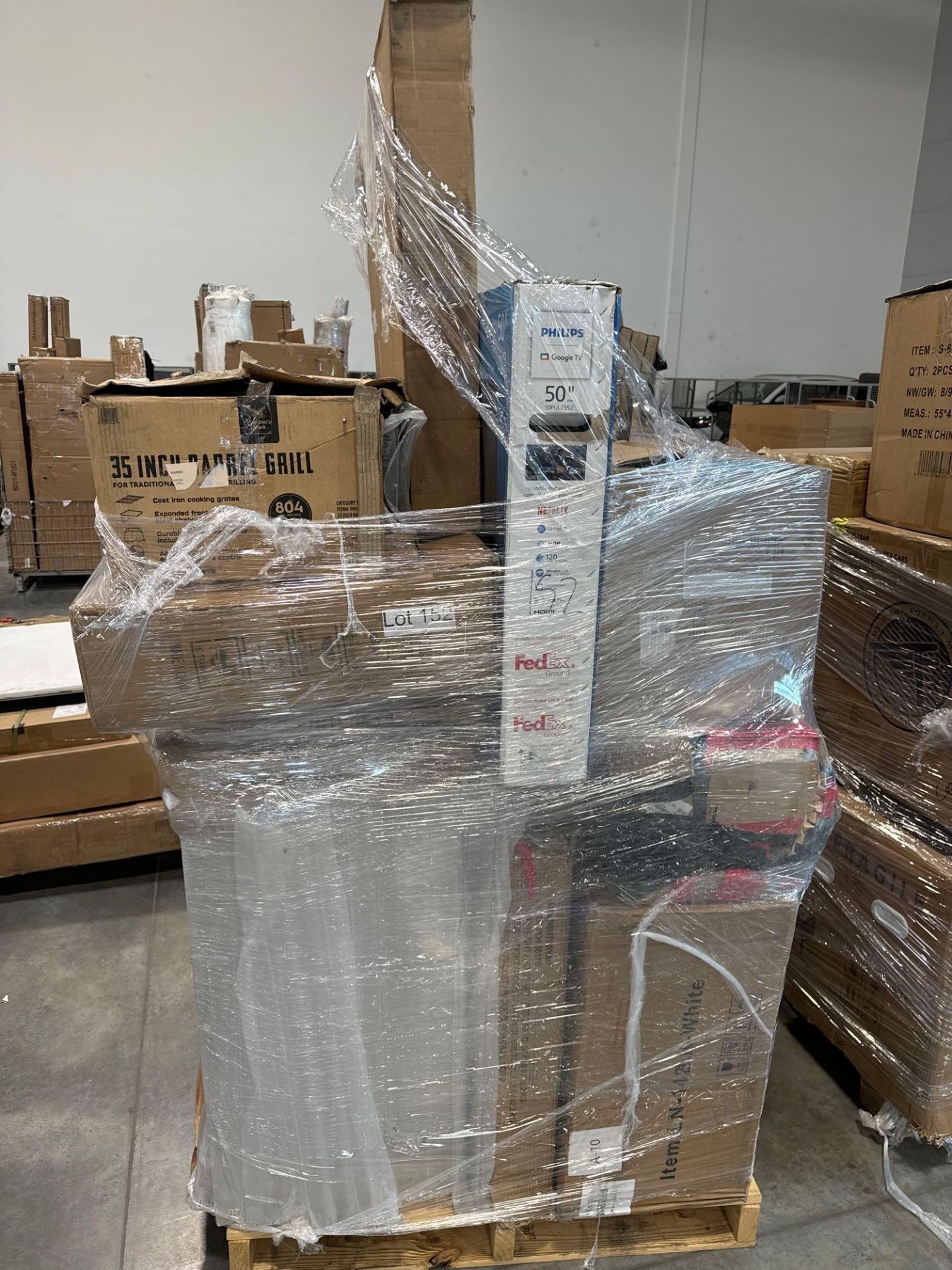 pallet of barrel grill accessories TV and more