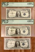 Currency: Two PCGS graded 1957 $1 Silver Certificates, Very Fine $1 1957 Silver Certificate, 1935 an