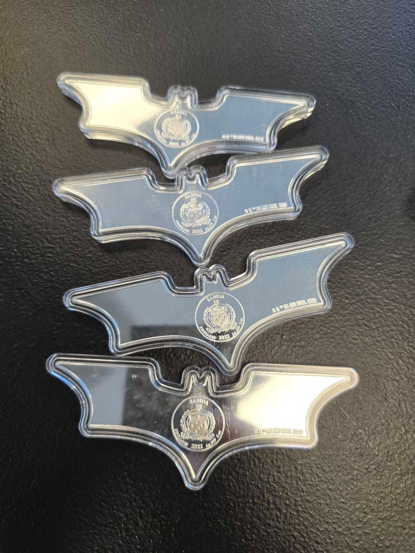 4 Silver Batarangs
