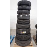 pallet of tires with wheels