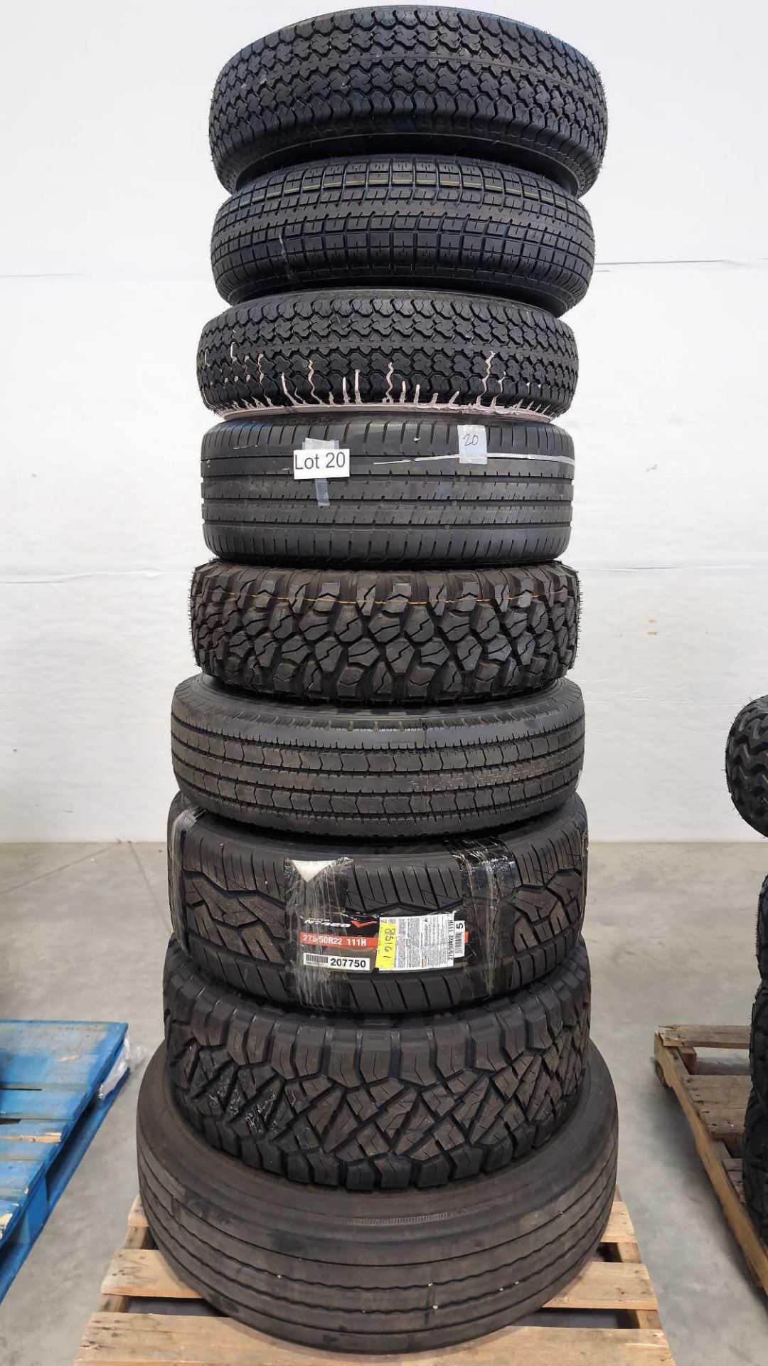 pallet of tires with wheels