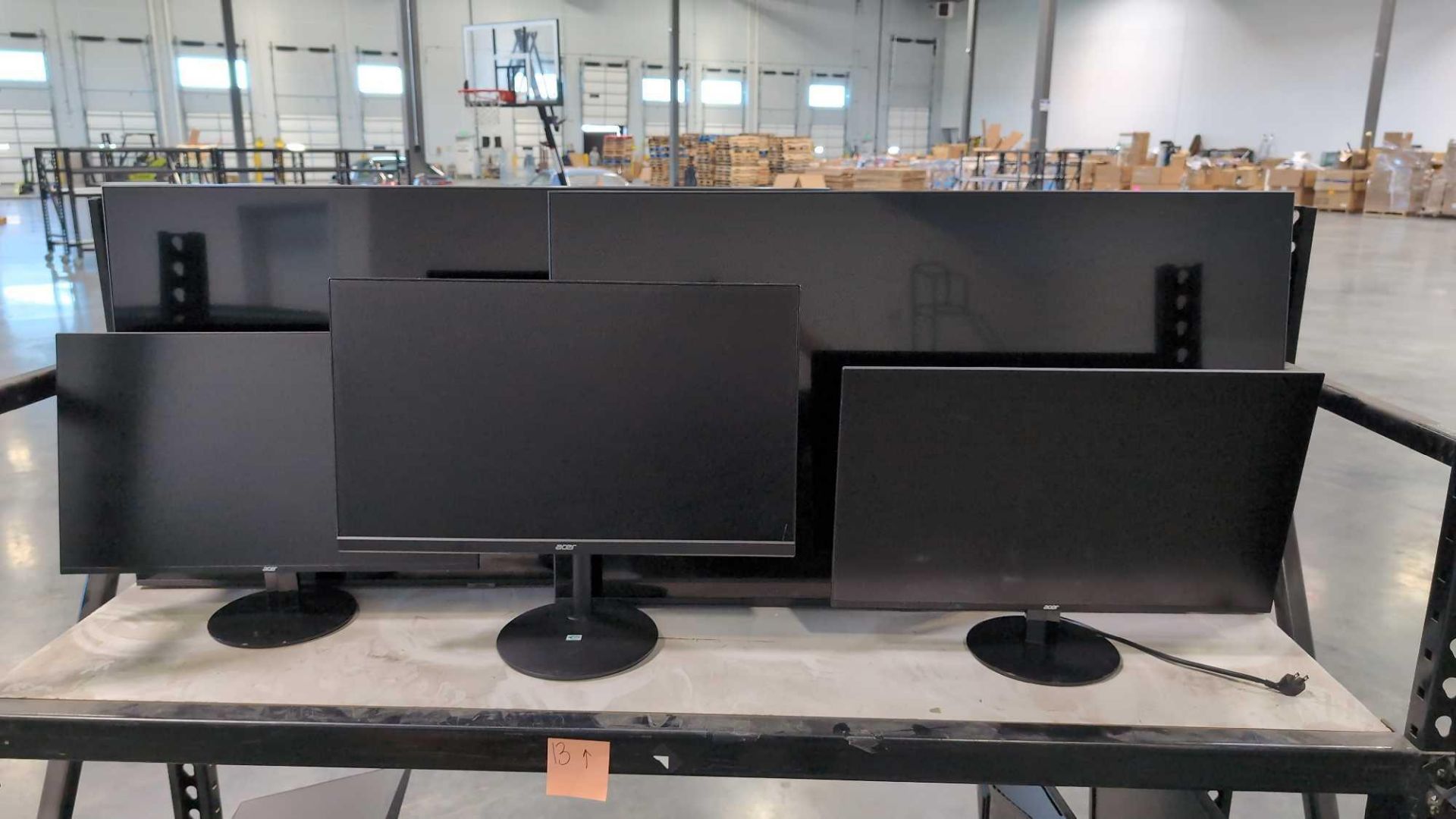 (2) used Samsung UN50TU7000F screens, and Acer monitors
