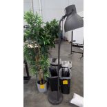 garbage cans and artificial plants and light