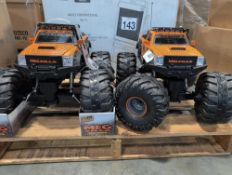 Two monster truck rc cars, one out of box, kids easel, Paw patrol car, Kids play kitchen