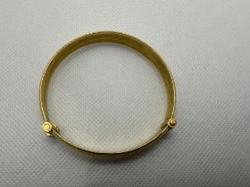 24ct Yellow Gold Bangle.