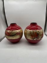 Pair Of Oriental Style Red and Gold Vases .