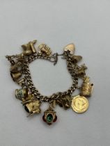 9ct Yellow Gold Charm Bracelet with 22ct 1909 Half