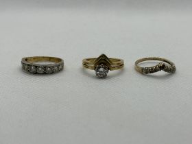Two 18ct and two 9ct Gold Rings.