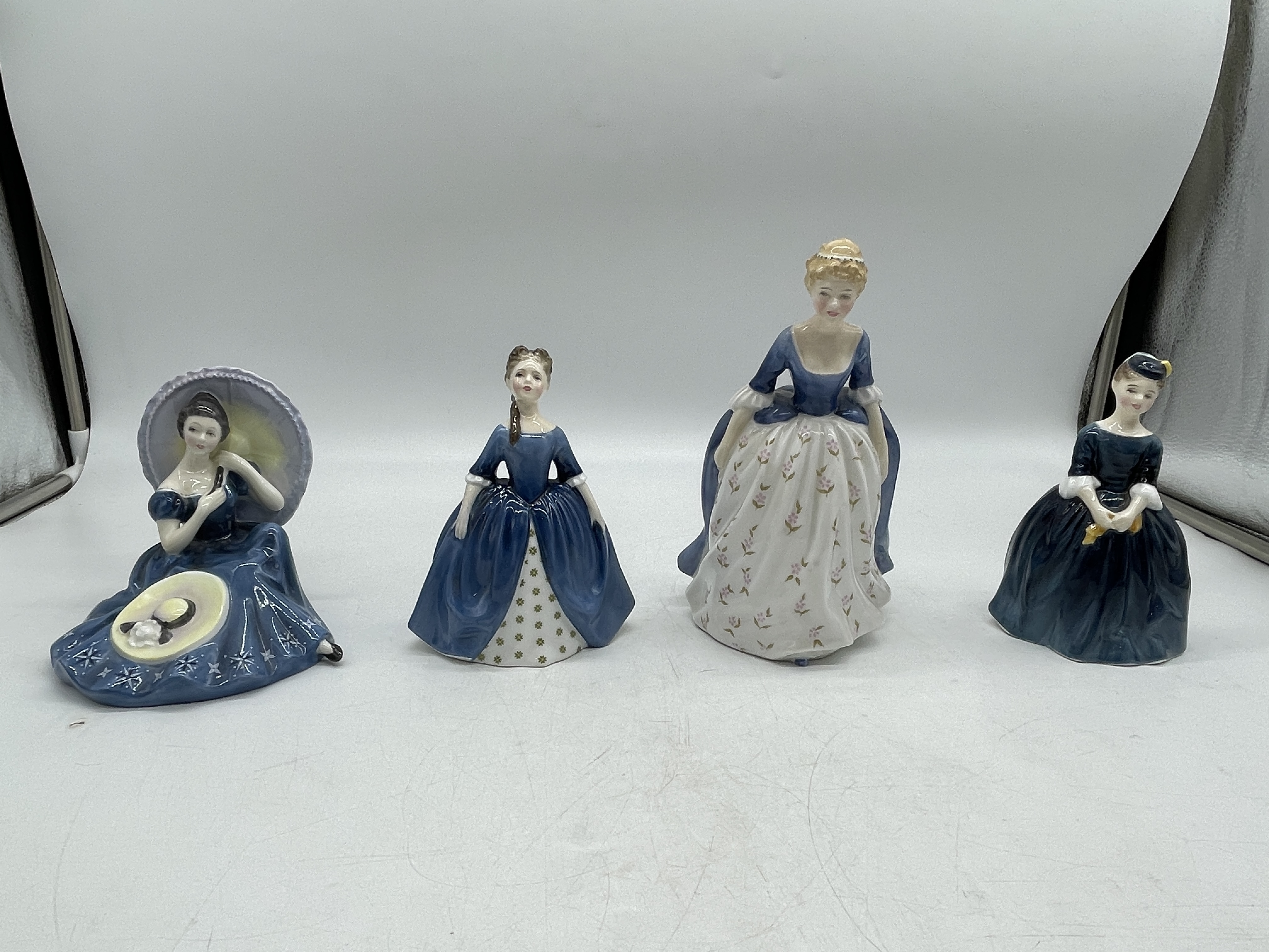 Blue Royal Doulton ceramic figurines