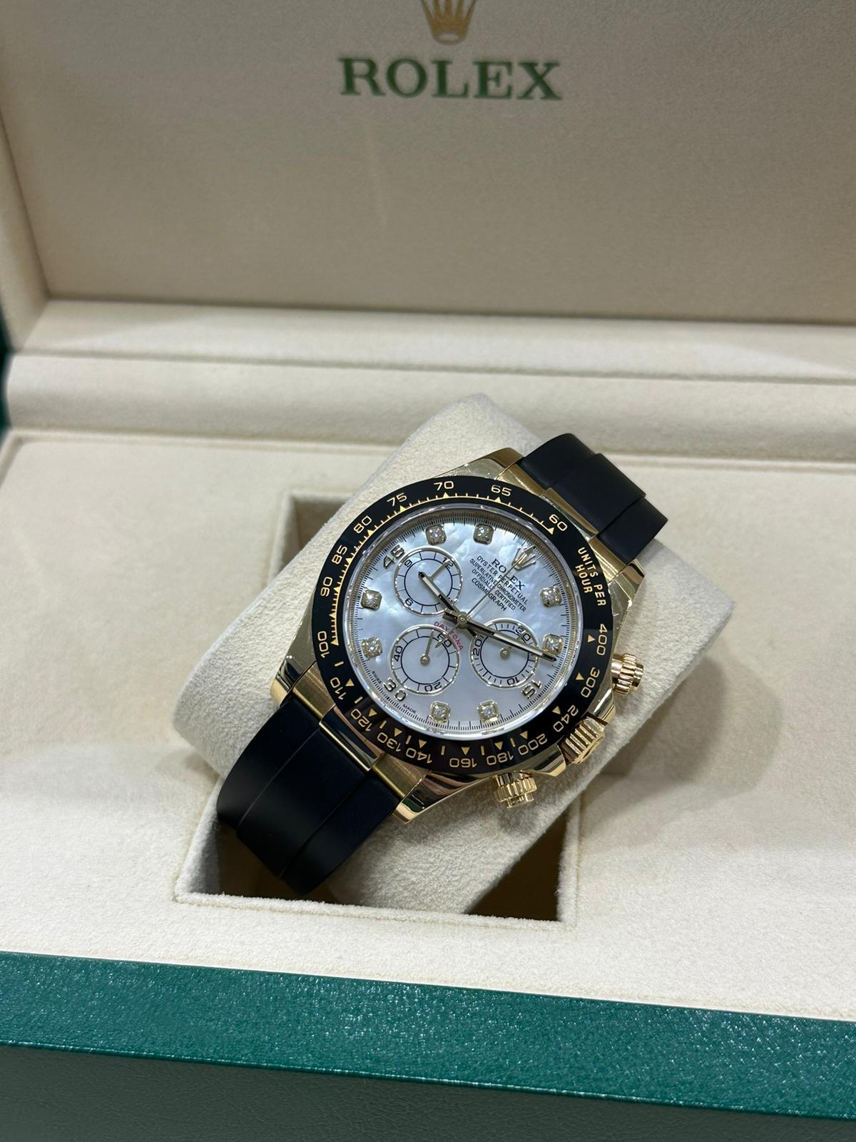 Rolex Daytona Oysterflex Yellow Gold with Rare factory MOP diamond dial complete with box and papers