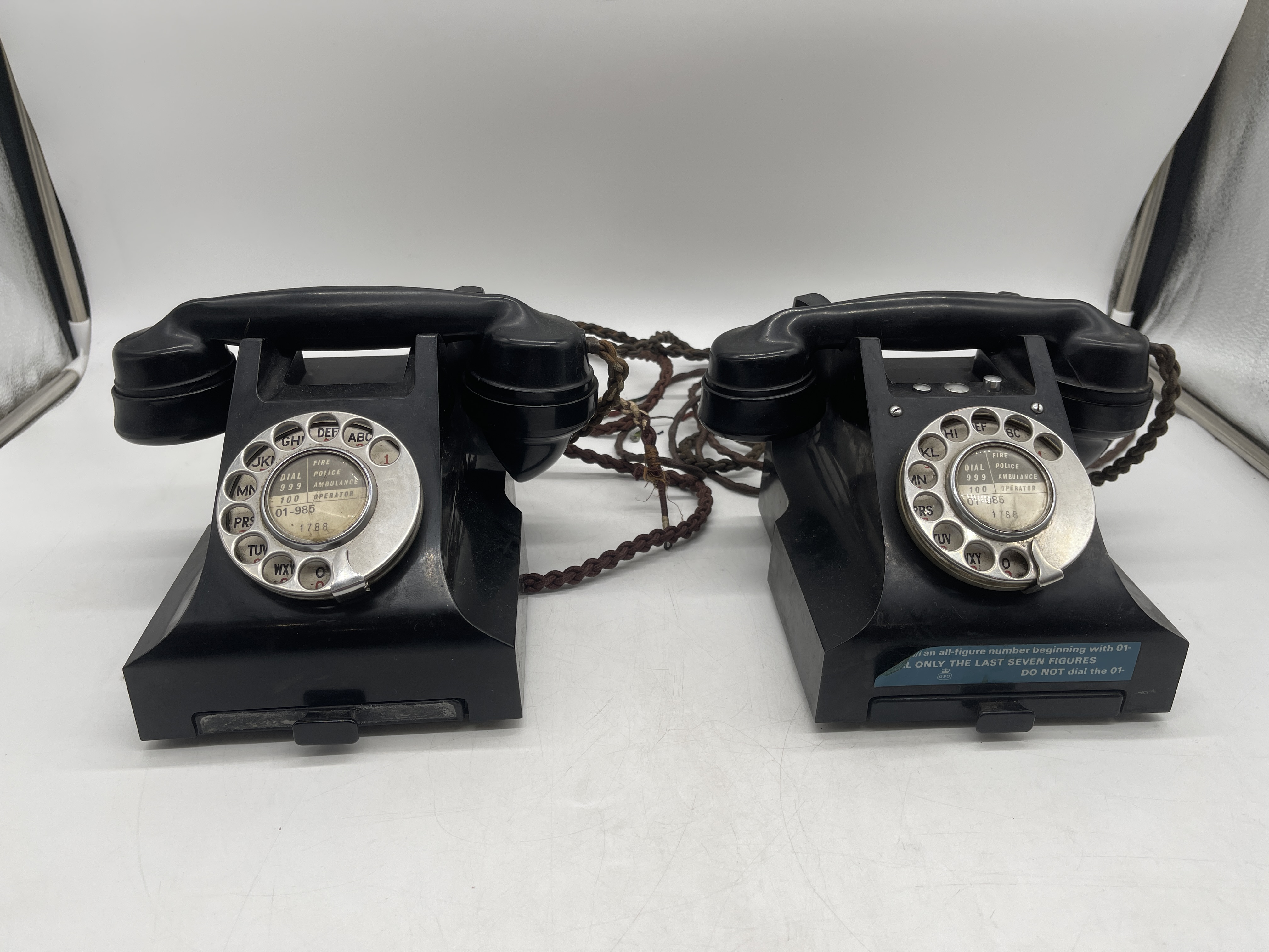Two Bakelite telephones