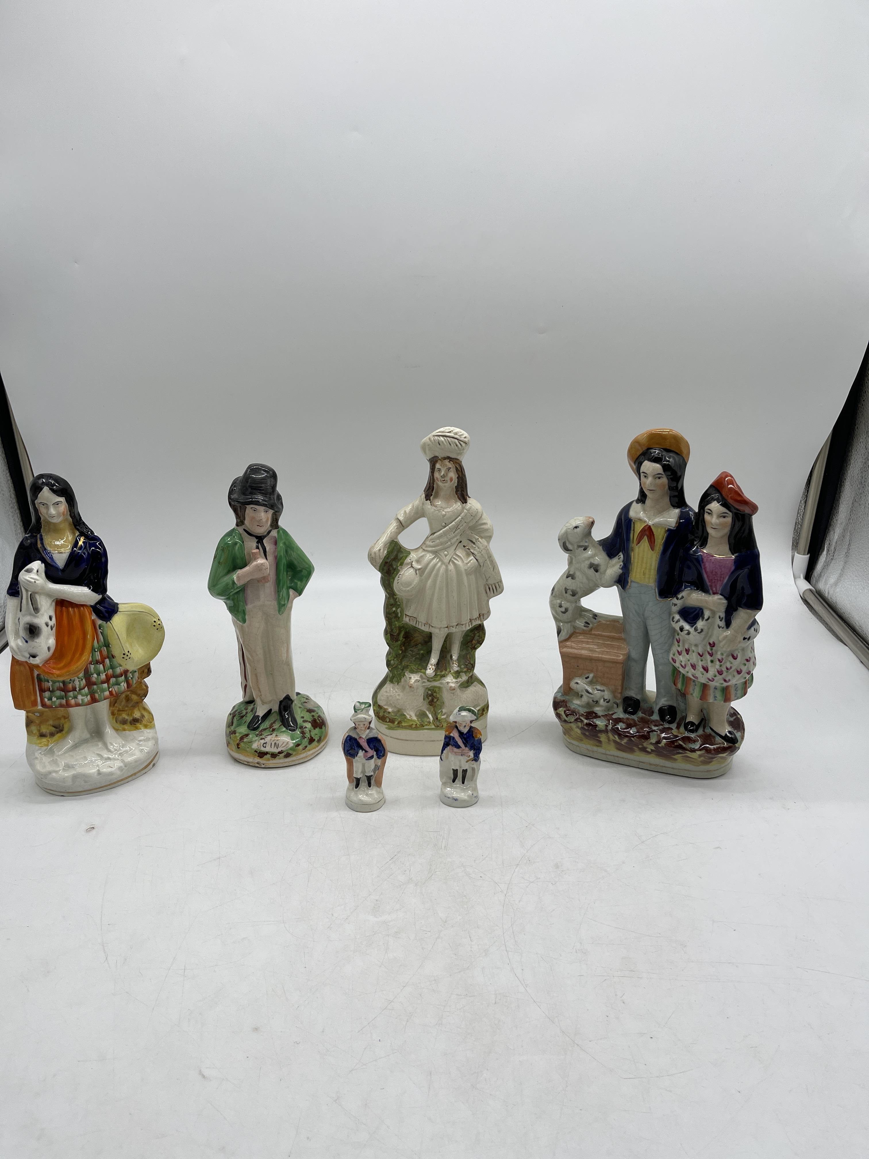 Six Assorted Staffordshire Figurines