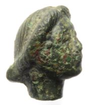 Roman Bronze head. Circa 1st-2nd century CE. Copper-alloy, 29mm x 28mm, 45.0g. Cast in the form of a