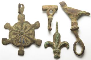 Medieval Harness pendant and Mount Group (4). Circa 13th-14th century AD. Copper-alloy,Â  largest