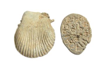 Medieval Artefacts Group (2). To include, a lead seal matrix detailed with a central floral device