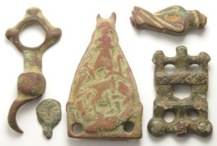 Viking artefact group including a stirrup mount, bridle mount and strap end. C. 11th century,