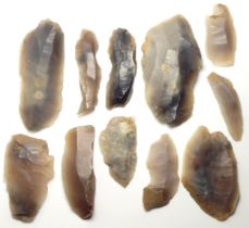 Neolithic flint blade group. 12 knapped flint blades, UK late Neolithic period c. 4000 BC - 2500 BC.