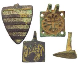 Medieval Heraldic Group (4). Circa 13th-14th century CE. Copper-alloy, largest 35mm. To include