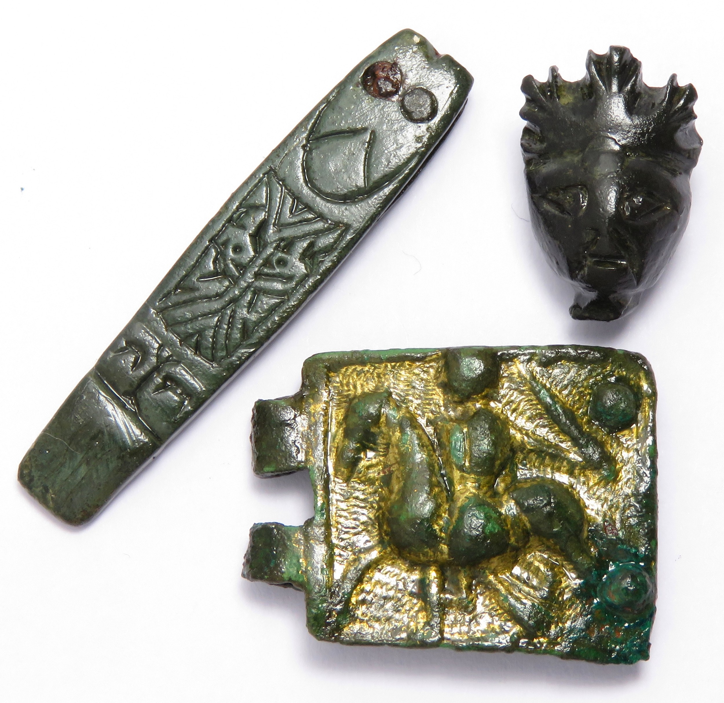 Anglo-Saxon & Medieval artefact group including a 8th - 9th century strap end, a Medieval buckle